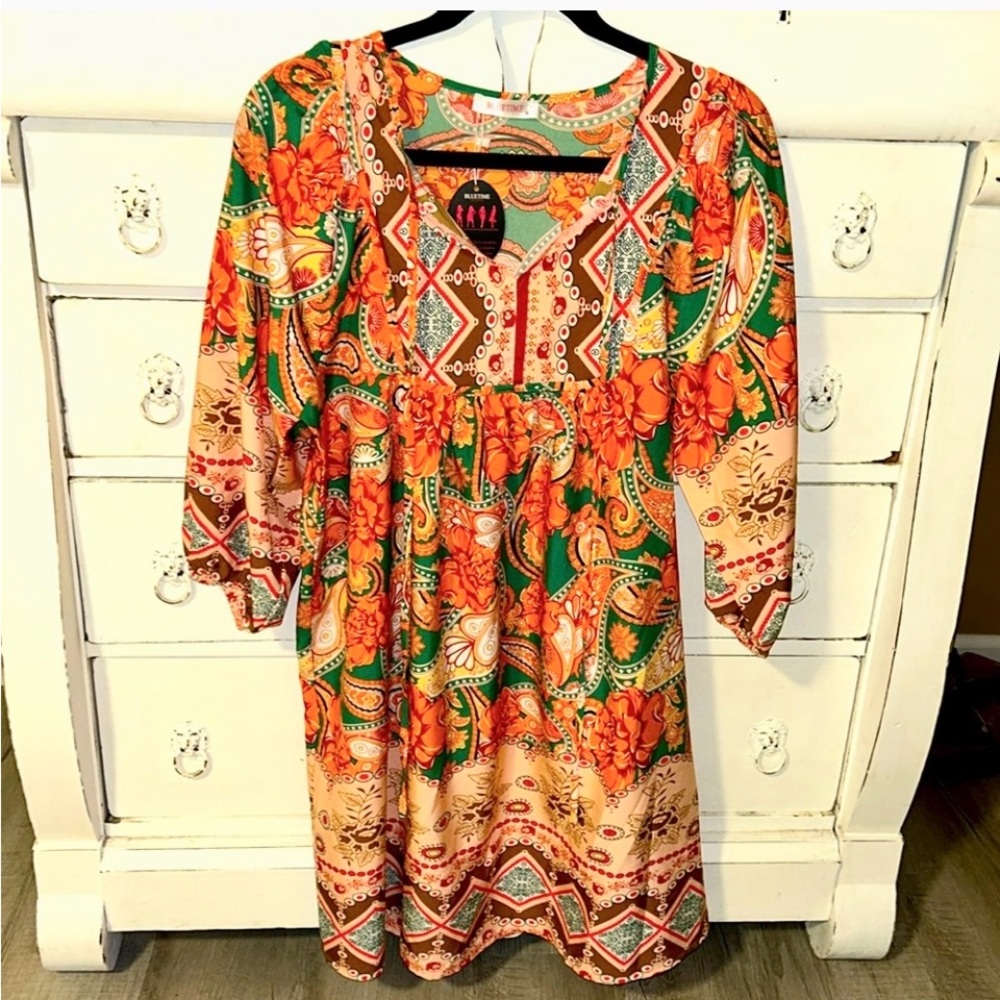 NWT super cute boho babydoll dress with puffy sleeves in size Medium